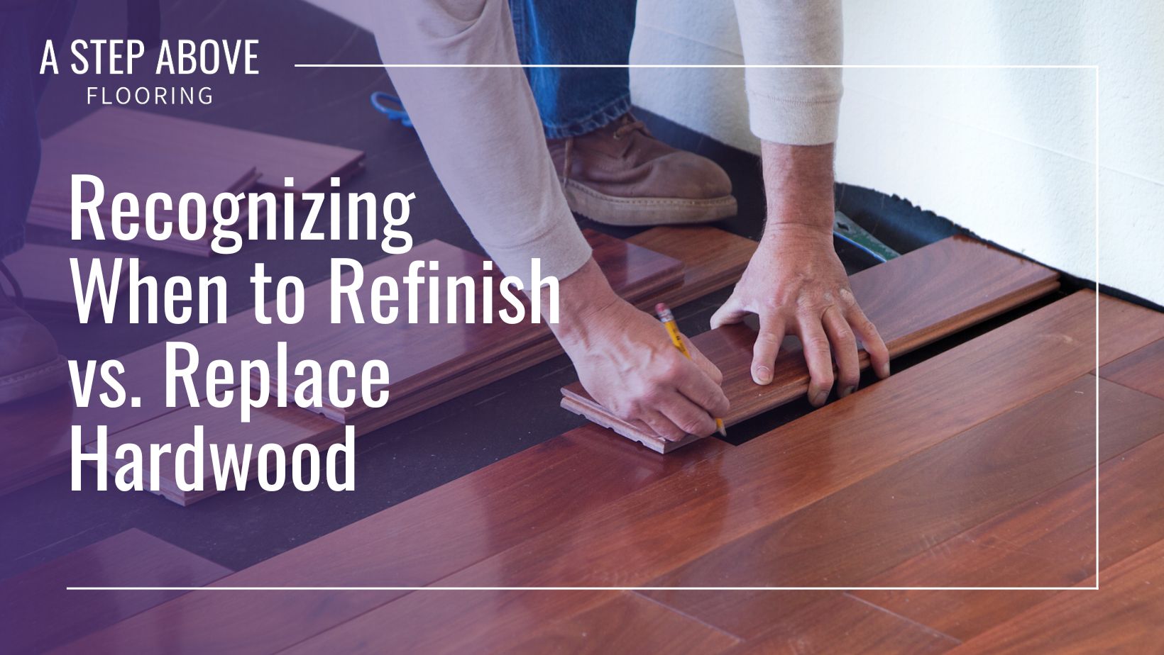 Hands installing hardwood flooring